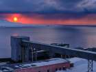 Sunset over the mine Russian coal mining town Barentsburg at fjord GronfjordenNorway Art Print